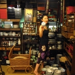 Mari browses antiques in a shop on the way to Shiga. Mari browses antiques in a shop on the way to Shiga.