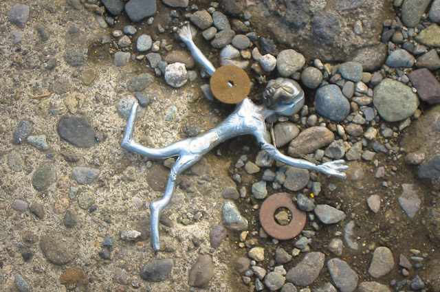 morton-alien-1 Burned alien on the sidewalk, probably left from the Fourth of July.